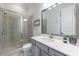 Modern bathroom with a glass-enclosed shower, stylish vanity, and sleek fixtures at 4405 Croftshire Pl, Cumming, GA 30040