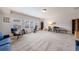 Large bonus room with sitting area, desk space, and lots of natural light at 4405 Croftshire Pl, Cumming, GA 30040