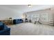 Spacious bonus room with neutral carpet, large windows, and ample natural light at 4405 Croftshire Pl, Cumming, GA 30040