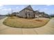 Charming two-story home with landscaped front yard and inviting curb appeal at 4405 Croftshire Pl, Cumming, GA 30040