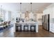 Bright kitchen featuring a large island, stainless steel appliances, and modern white cabinetry at 4405 Croftshire Pl, Cumming, GA 30040