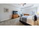 Serene main bedroom features a tray ceiling, calming color palette, and abundant natural light at 4405 Croftshire Pl, Cumming, GA 30040