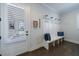 Functional mudroom with built-in bench, coat hooks, storage baskets, and natural light at 4405 Croftshire Pl, Cumming, GA 30040