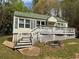 Charming single Gathering home featuring a welcoming front porch and a well-maintained yard at 675 Sowell Rd, Mcdonough, GA 30252