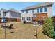 Expansive backyard with patio area, mature trees, and plenty of space for outdoor activities and entertaining at 7937 Habanera Ln, Lithonia, GA 30058