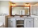 Bathroom with dual sinks, vanity and granite countertops at 7937 Habanera Ln, Lithonia, GA 30058