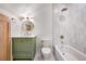 Charming bathroom with a green vanity, marble countertop, and a shower-tub combination at 1304 Marietta Country Club Nw Dr, Kennesaw, GA 30152
