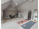 Well-equipped home gym with fitness equipment and plenty of open space at 1304 Marietta Country Club Nw Dr, Kennesaw, GA 30152