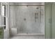 Sleek shower with built-in bench, rain shower head, and elegant tile work at 1304 Marietta Country Club Nw Dr, Kennesaw, GA 30152