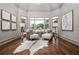 Cozy sitting area featuring ample natural light and stylish decor at 1304 Marietta Country Club Nw Dr, Kennesaw, GA 30152