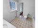 Bathroom featuring a toilet, a sink and a patterned tile floor at 160 Benjamin Cir, Fayetteville, GA 30214