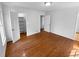 Bedroom featuring new hardwood floors, a closet, and a window at 160 Benjamin Cir, Fayetteville, GA 30214