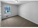 Bedroom featuring new carpet and a window at 160 Benjamin Cir, Fayetteville, GA 30214