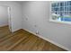 Utility room includes a window and flooring, offering natural light and a clean, simple space at 160 Benjamin Cir, Fayetteville, GA 30214