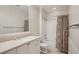 Well-lit bathroom with a shower-tub combo, vanity sink, and neutral decor at 4100 Paces Se Walk # 2309, Atlanta, GA 30339