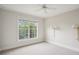 Bright bedroom with a ceiling fan and a large window provides natural light and ventilation at 4100 Paces Se Walk # 2309, Atlanta, GA 30339