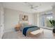 Staged bedroom with carpet, ceiling fan and balcony access at 4100 Paces Se Walk # 2309, Atlanta, GA 30339