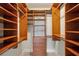 Spacious walk-in closet with custom shelving and drawers offers ample storage space at 4100 Paces Se Walk # 2309, Atlanta, GA 30339