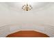 Charming dining room with hardwood floors, wainscoting, and classic chandelier offers an elegant space to entertain at 4100 Paces Se Walk # 2309, Atlanta, GA 30339
