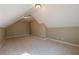 Spacious bonus room features carpet, neutral walls and ceiling lights at 6186 Talmadge Nw Run, Acworth, GA 30101