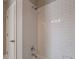 Bathroom with white subway tile shower and modern fixtures at 6186 Talmadge Nw Run, Acworth, GA 30101