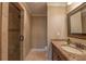 Beautiful bathroom featuring a granite countertop and a glass-enclosed shower at 6186 Talmadge Nw Run, Acworth, GA 30101