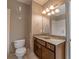 This bathroom features a single sink vanity and a decorative mirror at 6186 Talmadge Nw Run, Acworth, GA 30101