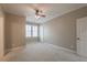 Bedroom featuring a ceiling fan with light and natural light from windows at 6186 Talmadge Nw Run, Acworth, GA 30101