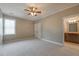 The bedroom is carpeted and features an en suite bathroom at 6186 Talmadge Nw Run, Acworth, GA 30101
