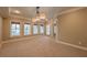 Bright dining room with large windows and a neutral color scheme, perfect for Gathering meals and gatherings at 6186 Talmadge Nw Run, Acworth, GA 30101