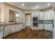 Well-equipped kitchen with stainless steel appliances and stylish cabinetry at 6186 Talmadge Nw Run, Acworth, GA 30101