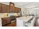 Modern kitchen featuring stainless steel appliances, granite countertops, and a breakfast bar at 709 Bismark Ne Rd, Atlanta, GA 30324