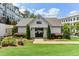 Community pool entrance with manicured landscaping, adjacent to a well-maintained lawn at 709 Bismark Ne Rd, Atlanta, GA 30324