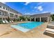 Inviting community pool with ample lounge chairs and a covered pavilion for relaxing by the water at 709 Bismark Ne Rd, Atlanta, GA 30324