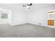 Bright bedroom with gray carpeting, fresh paint, and lots of space with easy access to bathroom at 3264 Henderson Mill Rd # C, Atlanta, GA 30341