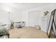 Sunlit bedroom with light wood floors offers a comfortable work space and ample storage at 3264 Henderson Mill Rd # C, Atlanta, GA 30341