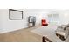 Cozy living area featuring neutral tones, a large window, and light hardwood flooring at 3264 Henderson Mill Rd # C, Atlanta, GA 30341