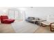Bright living room with modern decor, light wood floors, and large windows at 3264 Henderson Mill Rd # C, Atlanta, GA 30341