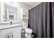Contemporary bathroom with a vanity, granite countertop, and shower with curtain at 4520 Jackybell Trl, Decatur, GA 30034