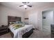 Charming bedroom features a rustic headboard, carpet floors, and access to a closet at 4520 Jackybell Trl, Decatur, GA 30034