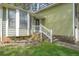 Inviting entrance with stone accents and manicured landscaping leading to the front door at 4520 Jackybell Trl, Decatur, GA 30034