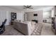 Cozy living room boasts a comfortable sectional, modern decor, and a ceiling fan at 4520 Jackybell Trl, Decatur, GA 30034