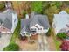 Aerial view of a landscaped home featuring a manicured lawn and inviting curb appeal within a residential neighborhood at 4829 Thicket Nw Path, Acworth, GA 30102