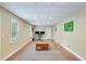 Spacious finished basement with recessed lights, wood trim, carpet, and laminate flooring, perfect for versatile use at 2830 Willow Hill Ct, Cumming, GA 30040