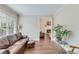 Cozy living room with hardwood floors and ample natural light at 2830 Willow Hill Ct, Cumming, GA 30040