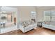 Open-concept living room seamlessly connects to the kitchen at 2830 Willow Hill Ct, Cumming, GA 30040