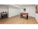 Finished basement featuring laminate floors, and a foosball table at 2905 Dale Creek Drive Nw, Atlanta, GA 30318