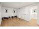 Finished basement featuring wood-look flooring, beadboard paneling, and modern decor at 2905 Dale Creek Drive Nw, Atlanta, GA 30318