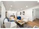 Bright and airy living room featuring hardwood floors, recessed lighting, and stylish contemporary decor at 2905 Dale Creek Drive Nw, Atlanta, GA 30318