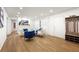 Bright living room with light wood floors, fireplace, and modern furnishings at 2905 Dale Creek Drive Nw, Atlanta, GA 30318